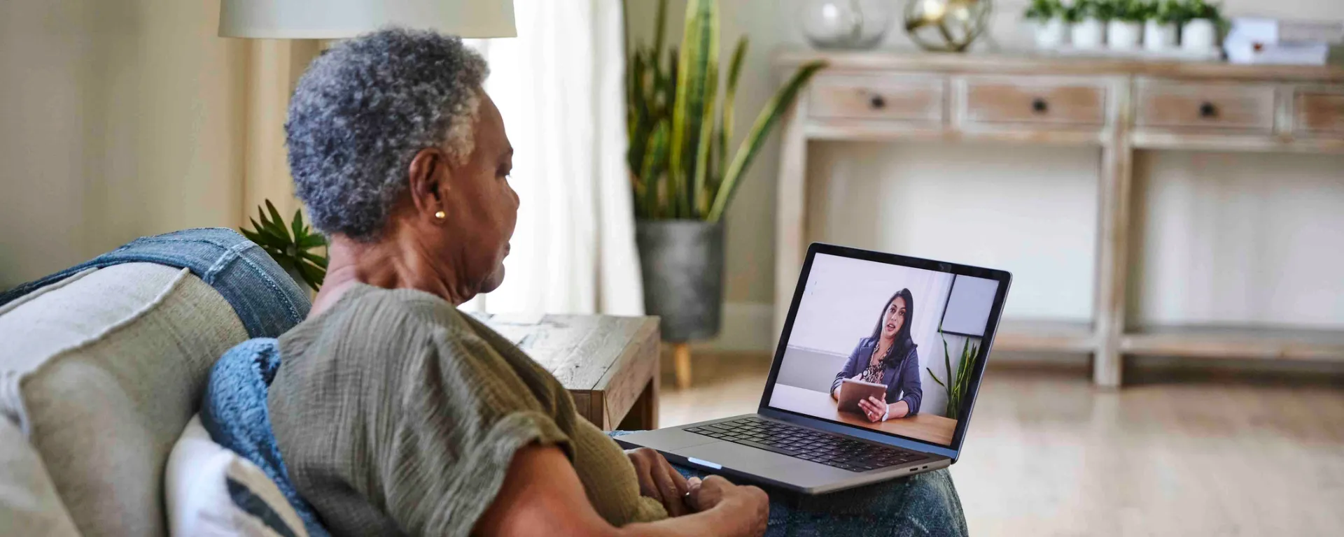 Senior female taking online through laptop at home 1474811323 1920x768