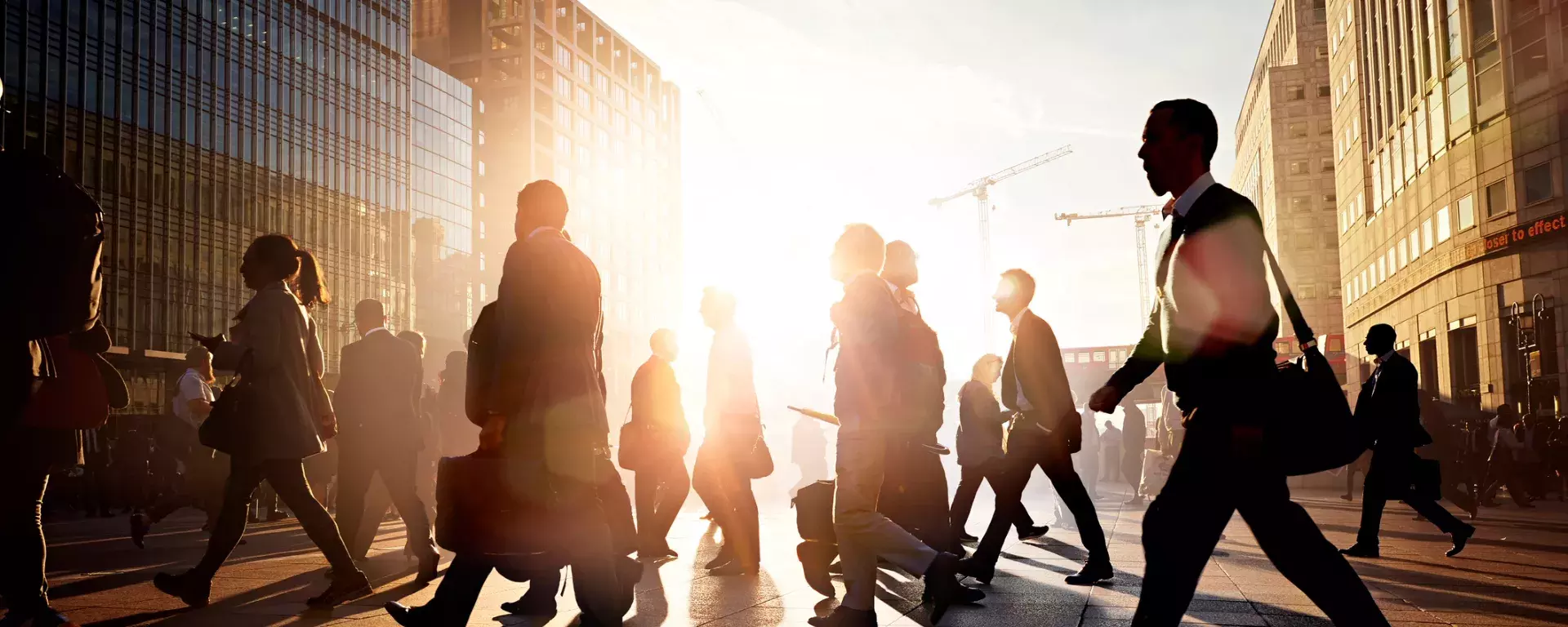 Employees walking to work in the city 674977783